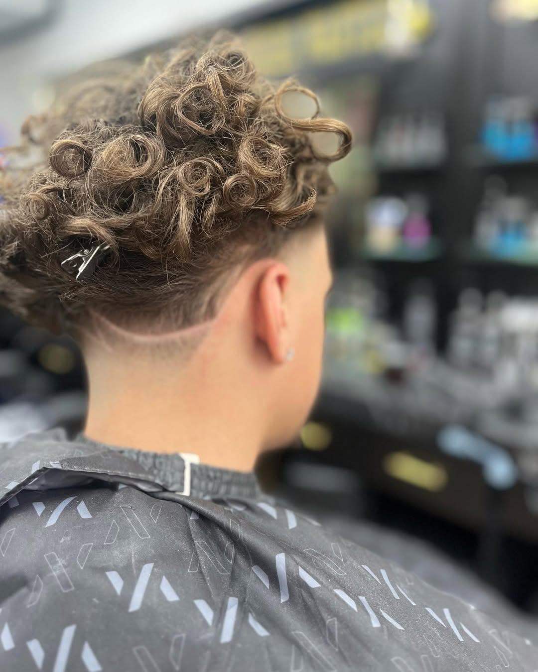 Coupe boucles avec fade